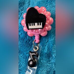 Pink and Black Piano Badge Reel